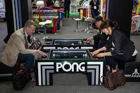 Atari pong coffee table with 2 pong ottomans atari pong coffee table a crazy twist on an arcade classic! The Best Addition To Any Office Space Atari Pong Coffee Table Classic Video Games Atari Games Pong