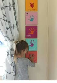 hand prints can be used for height chart baby crafts