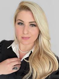 Corinne McConnell, B.A., B.Ed., J.D.