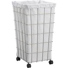 The hampers are also available in several different colors, including a sleek white made from wire and finished in white, this hamper pulls out via a roller tray on the base, so it is able to slide. Wire Hamper With White Liner 54 95 Laundry Hamper Rolling Laundry Basket Laundry Basket On Wheels