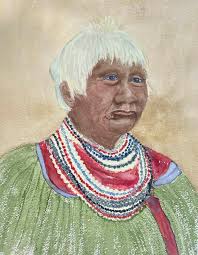 SEMINOLE INDIAN WOMAN SEWING...(faded & illegible)", a 1940s EKC RPPC  courtesy of an internet auction.