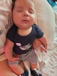 My little one in one of many shark clothing items 🤣