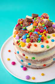 Decorating a cake with candy. Neapolitan Cake Quick And Easy Sweetest Menu