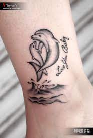 Epresents Like Mother Like Daughter With Her Love Of Dolphins Deisgn Tattooart Inkgirls Colourink T Tattoos For Daughters Dolphins Tattoo Mother Tattoos