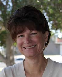 Woman of Continuous Service looks