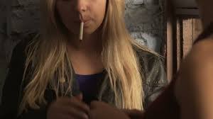 Keep calm and chive on! Blonde Girl Smoking While Listening Stock Footage Video 100 Royalty Free 22979665 Shutterstock