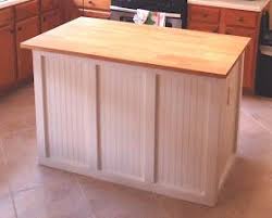 Build an island base from 2x4s to make sure our island is not going to move around, it requires a base to secure it to the floor. Walking To Retirement The Diy Kitchen Island Kitchen Design Diy Unfinished Kitchen Cabinets Kitchen Island Makeover