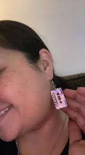 Does anyone recognize the artist? One earring has the bottom animal not  balanced right and I would like to have it repaired. They were a gift to me  in the 80s