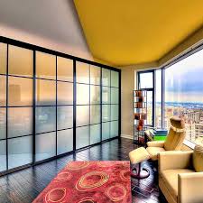 In this loft, the pax system served as an entertainment center for the living room and a closet for the bedroom in a. Room Dividers Glass Glass Room Divider Doors The Sliding Door Co