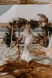 Modern Bohemian Wedding At The Beach With The Super Trend Dry Palm Leaf Wedding Decoration Beach Wedding Beach Wedding Aisles Palm Trees Wedding