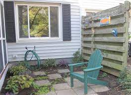 What A Little Paint Can Do Garden Rant Diy Privacy Screen Paint Cans Painting