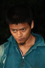 Seguridad "Estamos hablando de Carlos Valladares Coreas, de camisa azul,  este es el corredor de la clica Witmer Locos Salvatruchos de acá del  municipio de Comasagua y este señor de camisa verde