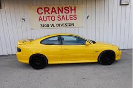 Image result for Yellow 2004 Pontiac