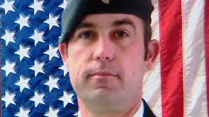 Soldier who died trying to rescue daughters laid to rest at Arlington