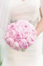 Roses, ranunculus, lisianthus and stephanotis create a very soft and romantic look: 35 Prettiest Peony Wedding Bouquets Deer Pearl Flowers