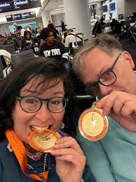 Why did I start running? We cheered at the NY Marathon. Then we  volunteered. Then we met a college classmate