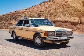 The w124 is solid, stable, and substantial in all respects, even down to the way the doors close. Beige Mercedes Benz Sedan Parked Near Mountain Photo Free Car Image On Unsplash