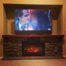 This diy idea lets you build a pallet fireplace tv stand—genuine or synthetic. Diy Electric Fireplace Hearth Tv Stand The Components Are Hidden Behind The Stonework And Fireplace Tv Stand Electric Fireplace Tv Stand Tv Stand Designs