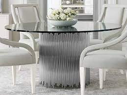 Its ash solids and veneers wood top finished in heather grey complements perfectly the sophisticated cast pedestal with embossed leather pattern for a very chic result. Bernhardt Calista Polished Nickel Clear 60 Wide Round Dining Table Bhk1240
