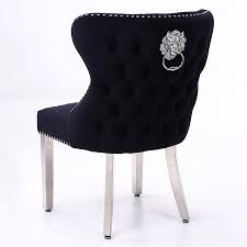 Lush foam padding is wrapped in a soft velvet fabric that is easy to clean and care for. Diana Wide Black Velvet And Chrome Dining Chair With Lion Ring Knocker Picture Perfect Home