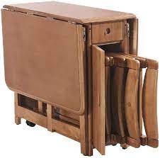 Folding tables and folding chairs are great space savers and can be easily stowed away when not in use. Amazon Com Hongteng Retractable Folding Dining Table Combination Modern Minimalist Solid Wood Multifunctional Storage Small Household Computer Desk Kitchen Dining