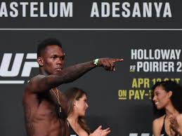 Midnight Mania Adesanya Reacts To First Fan Ink Guess I Gotta Tattoo His Face On My Leg Now Mmamania Com