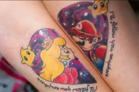 52 Shocking Couples Tattoos Ideas And Images 2019 Piercings Models Mario Tattoo Couple Tattoos Gamer Tattoos