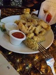 The first fish tacos were like these: Happy Hour Calamari Baja Fish Tacos Picture Of Mccormick Schmick S Seafood Steaks Houston Tripadvisor