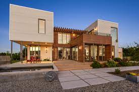 Is an enclosure within which workers, prisoners, or soldiers are confined or compound can be anything made by combining several things. Two House Compound In California Wine Country Is Smart And Green