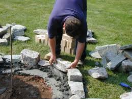 You can continue to lay another layer of mortar and then place a brick on top. How To Set Stones For A Fire Pit How Tos Diy