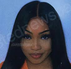 This woman's mugshot is going viral after she was arrested for going to her  ex-boyfriend's house and filling his gas tank with pre-sucked Skittles and  Coke Zero #LRHN