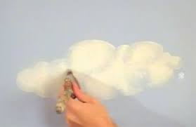 Clouds are often painted on the ceiling of a nursery or a child's room to enhance a decorative theme based on nature or fantasy, but clouds overhead can help a small room feel larger. Painting Clouds On Wall Painting Inspired