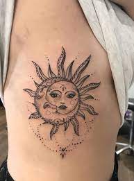 The duality of these two heavenly bodies reflects how opposites complete each other. Sternum Tattoo Women Sun And Moon Novocom Top