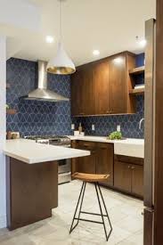 This design involves geometric patterns in monochrome, bold, and intricate designs giving your kitchen a revamp look. 25 Best Kitchen Backsplash Ideas Tile Designs For Kitchen Modern Kitchen Tiles Design Pictures