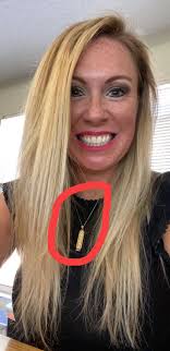 Gold pendant found in Androscoggin River