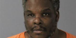 Jackson man pleads guilty to being a felon in possession of a firearm