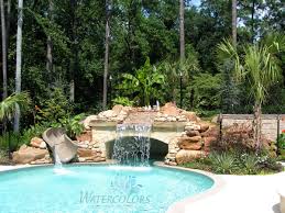 Select from a massive variety of inground pool waterfall that are aesthetically appealing and sustainable enough to be used both residential and commercially. Fancy Stone Inground Pool Water Slide Freeform Inground Shotcrete Pool With Grotto Cave Waterfall Backyard Pool Landscaping Backyard Pool Pool Landscaping