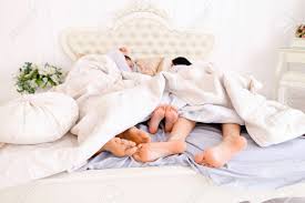 We did not find results for: Husband Wife And Daughter Sleep In Bed Taking Close Up Family Feet To Embrace Mom Dad