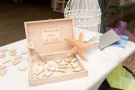 This white pearl starfish bracelet for the bride. Creative Wedding Guest Book Idea