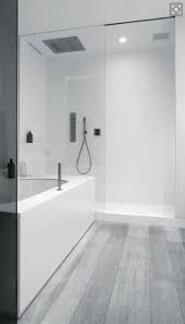 Traditionally, tiles are used in wet areas bathroom can be made luxurious with the help of stylish tiles which can be used for entire bathroom. Seamless White And Concrete Combination No Tiles No Grout Easy Clean Bathroom Design Modern Bathroom Design Minimalist Bathroom