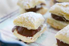 Miguelitos With Chocolate Food Fanatic Spanish Dessert Recipes Desserts Spanish Desserts