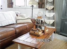 The tabletop is made from solid pine wood and has a butcher block style with visible wood grain and knots for a rustic, antique look. Farmhouse Coffee Table Diy Your Decor Prodigal Pieces