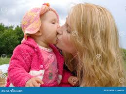 Mom and Daughter in a park stock photo. Image of kisses - 5574128