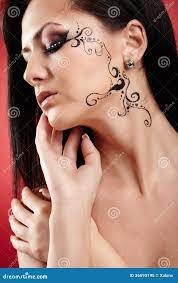 Beautiful Brunette with Facial Tattoo Stock Image - Image of model,  background: 36693195