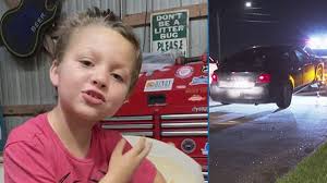 Dodge car towed from complex where search teams are looking for little boy