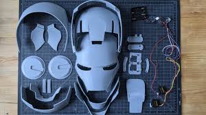 Repairman hand in gloves close up with hammer and wrench tools over black background. Iron Man Helmet Arduino Setup Youtube