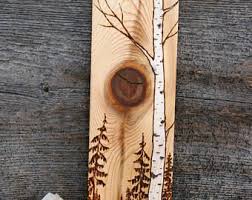 Why is seasoned firewood best for wood the problem many homeowners run into is burning green or damp wood. Distant Shores Wood Burned Art Block Art Block Wood Art Art