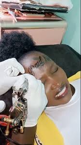Lady tattoos her boyfriend's name