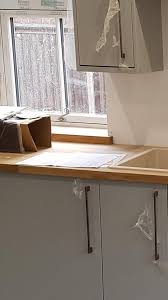 Average kitchen countertops with inset sinks stand at about 36 inches high. Minimum Kitchen Sink Window Height From Floor Building Regulations Buildhub Org Uk