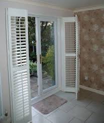 French doors can pose a problem for homeowners. Patio Door Shutters By Shutter Master Of London Uk Door Coverings Patio Door Coverings Patio Door Shutters